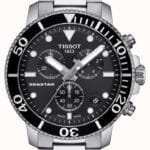 ساعه من tissot تعمل بعدادات بلون اسود وسير فضي من المعدن