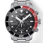ساعه من tissot تعمل بعدادات بلون اسود وسير فضي من المعدن