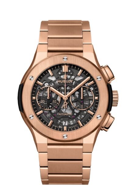 ساعة من Hublot تعمل بعدادات بلون اسود وسير دهبي من المعدن