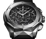 ساعه منHUBLOT تعمل بعدادات بلون اسود وسير اسود من المطاط