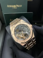 ساعة ِAudemars Piguet تعمل بعدادات بلون اسود  وسير نحاسى من المعدن